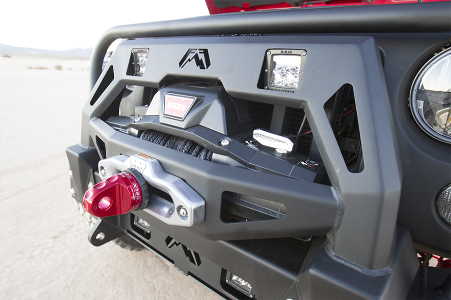 The front bumper of the Rubicon hosts a WARN winch.