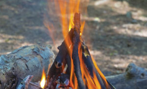The tipi fire lay is easy to make, lights quickly and burns fast. It is often the fire used as the starting point for a larger fire built off of it by adding more wood either higher or on its sides.