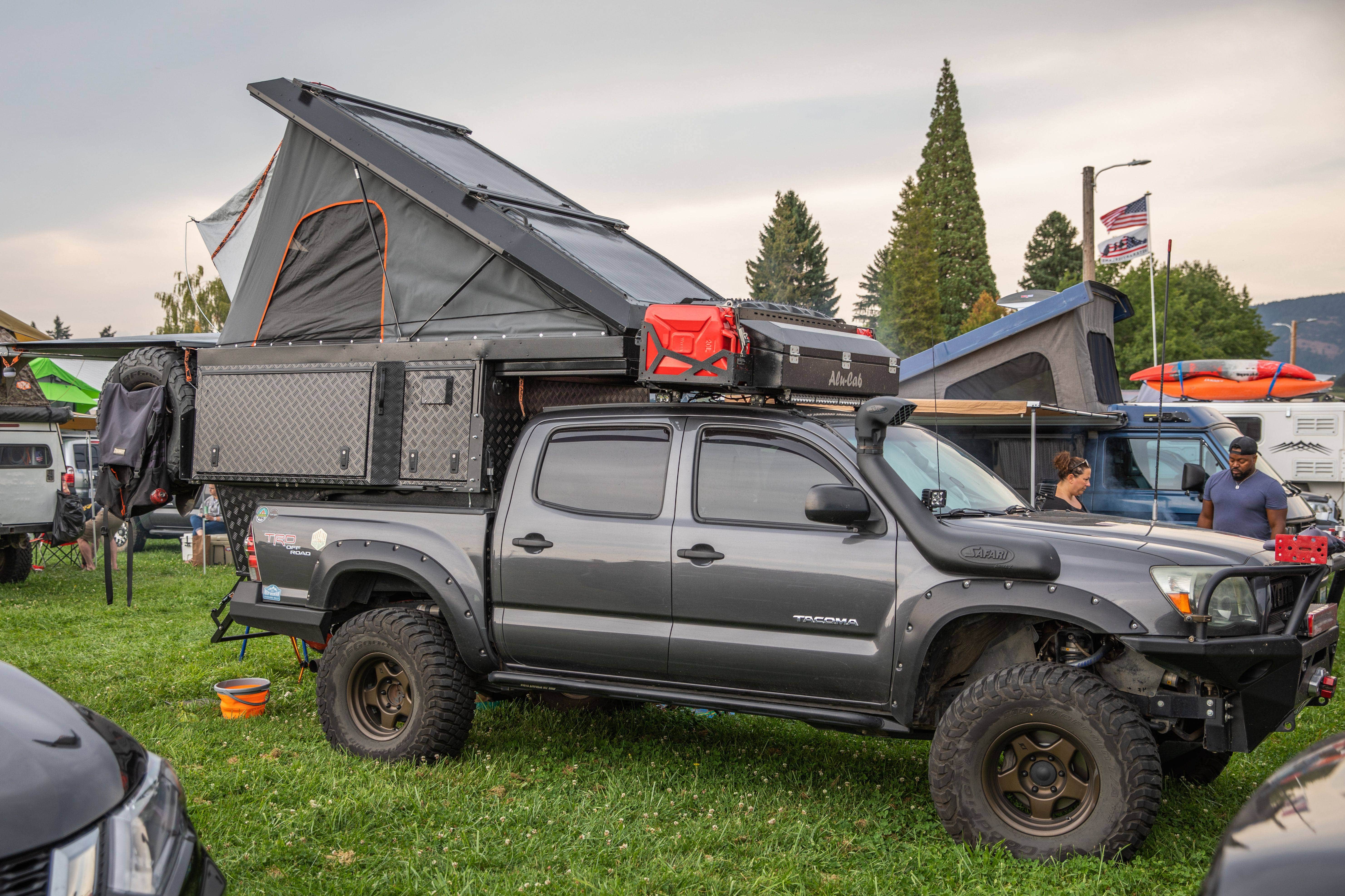 Toyo Tires Trailpass: Gray Toyota Tacoma with Alu-Cab Khaya tent and camper