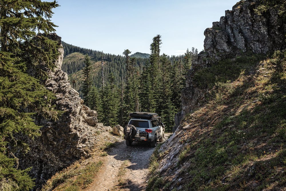 Toyota Land Cruiser 200 Series rearview mountain road