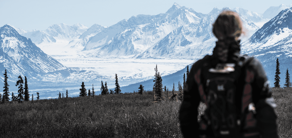 Lisa Morris looking at snowy mountains