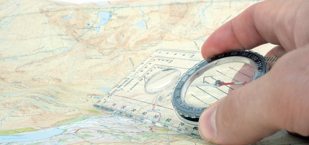 compass and map for backcountry navigation