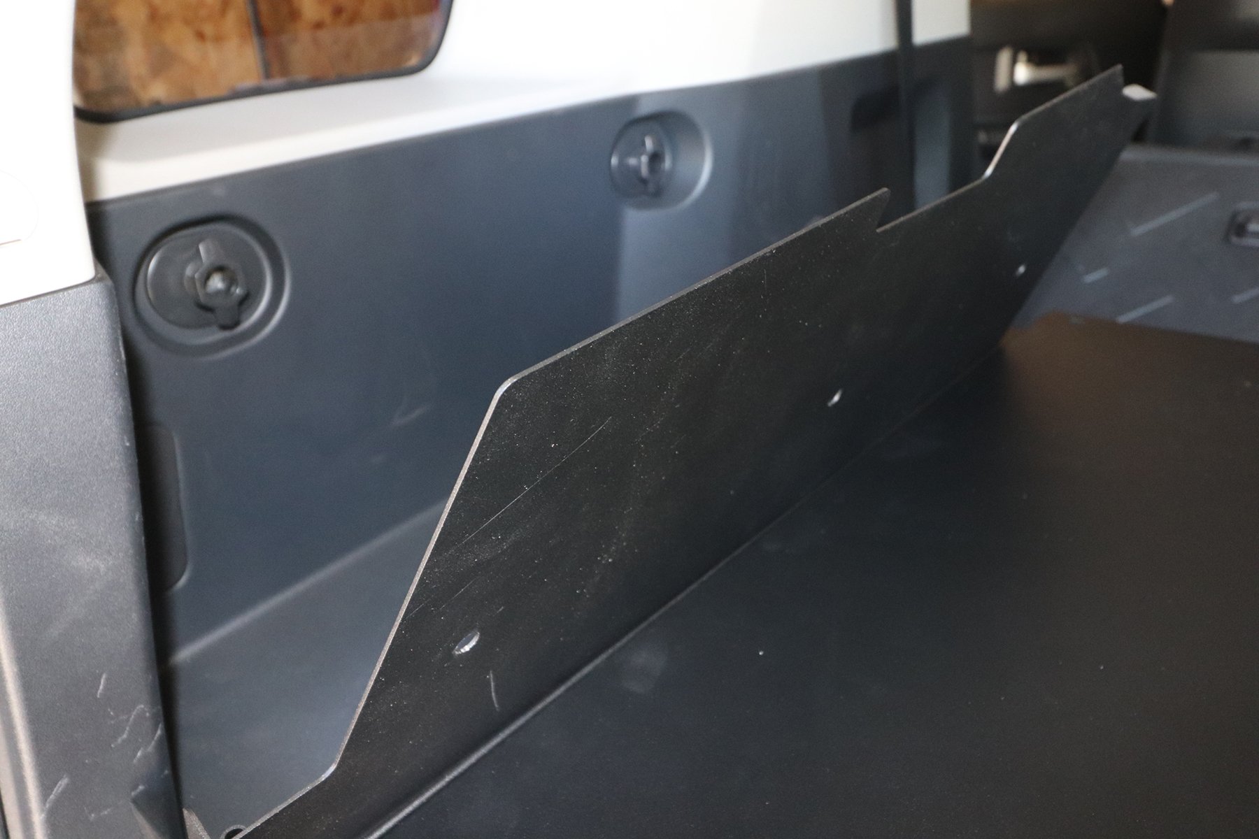 Hinged Lid Panels Reduce Vehicle Break-Ins