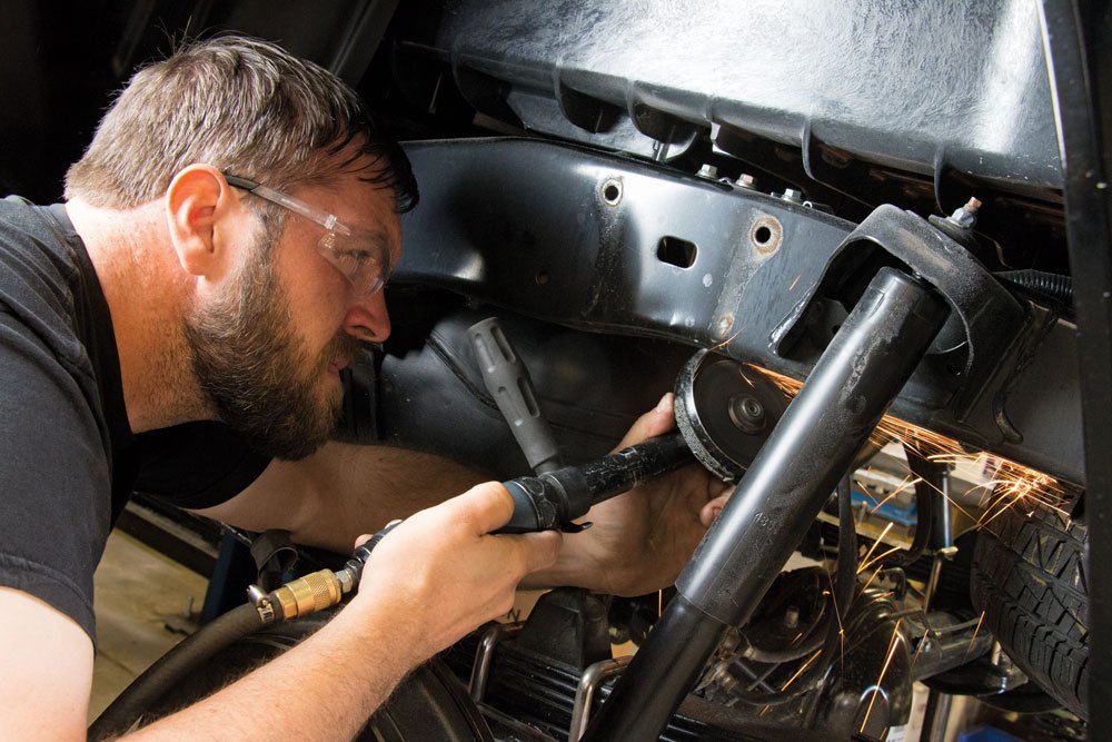 Man working on a suspension