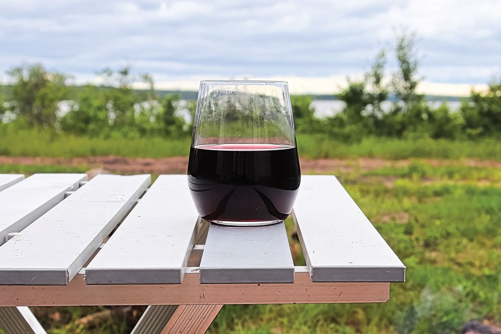 glass of wine at the campsite