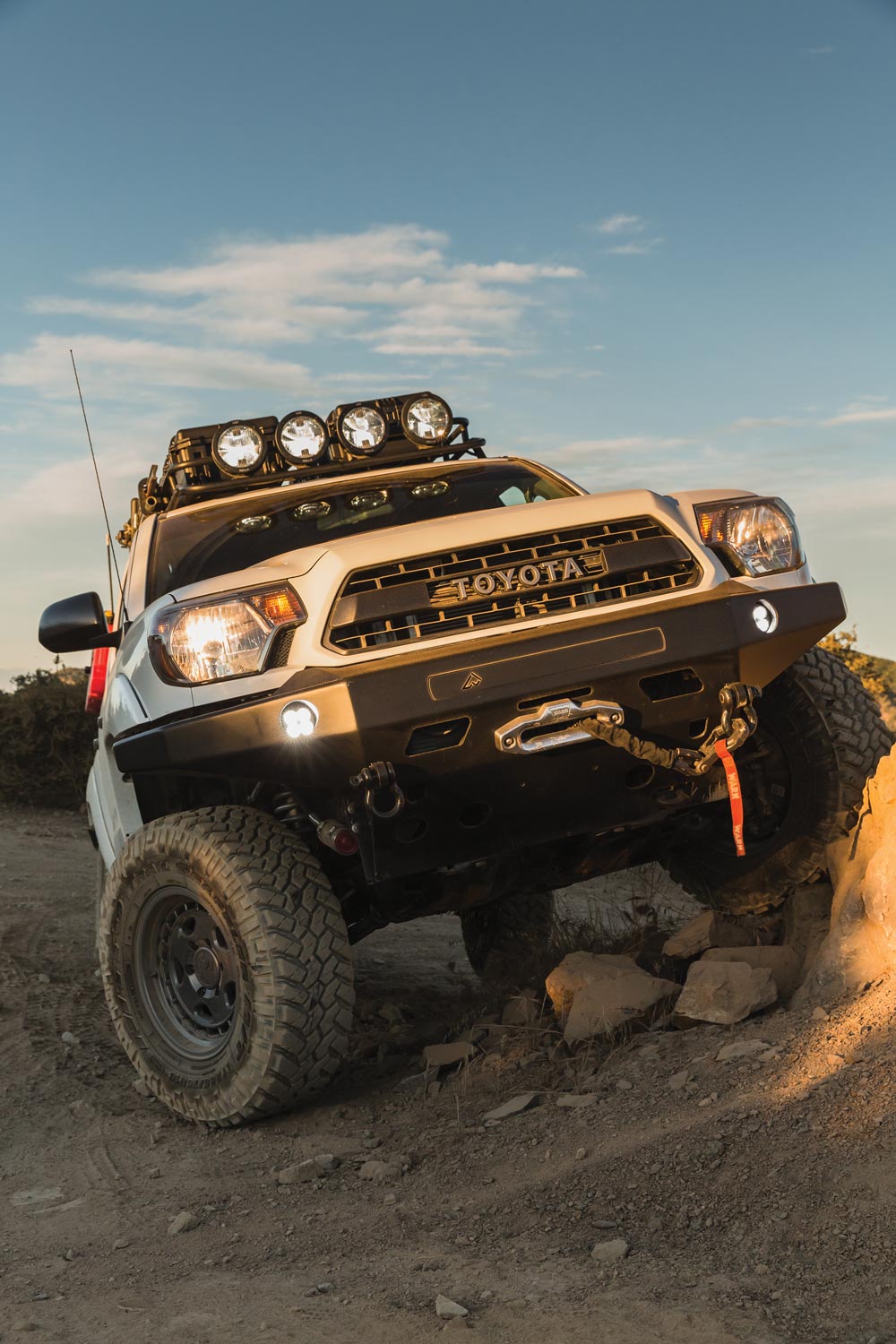 Pelfreybilt aluminum front bumper houses Hella Micro 70 LED lights, Warn winch, Epic winch hook