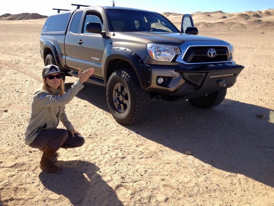 Emily Miller showing off her vehicle