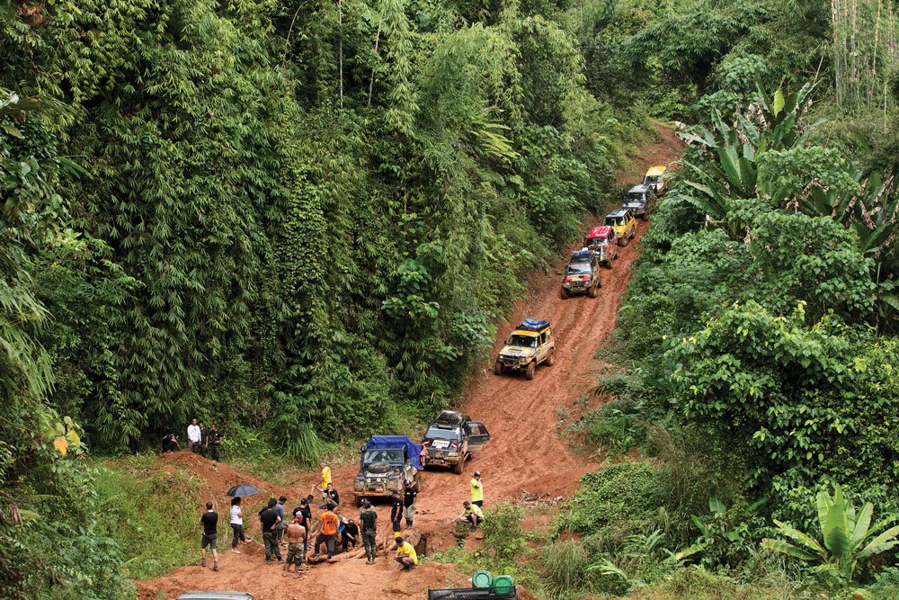 Waiting on another washed-out bridge in the Malaysian Highlands