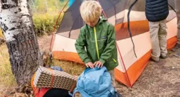 Putting the camping tent together as family