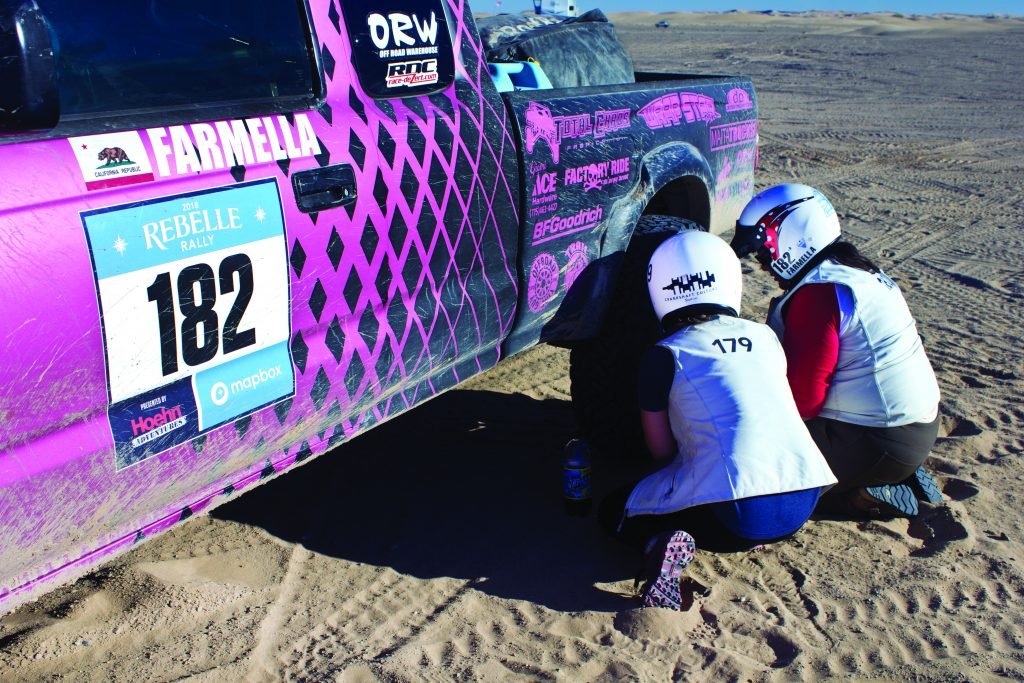 Women tag-team together to deflate tires 