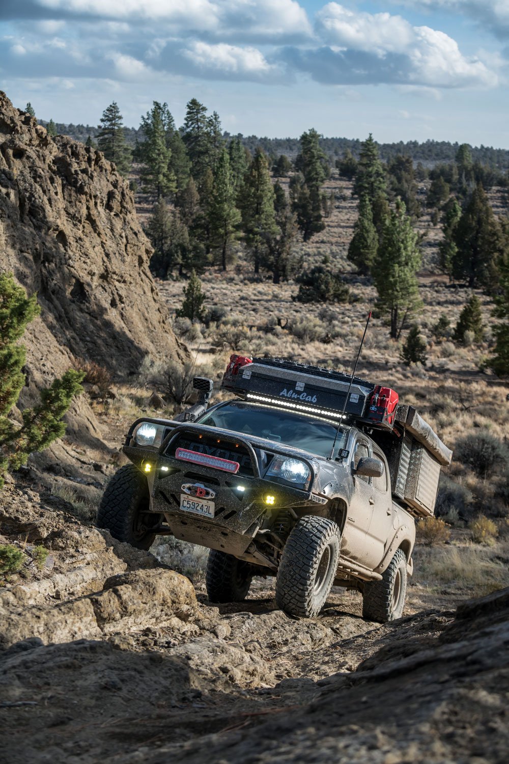 2010 Tacoma TRD Off-Road and Khaya Camper rock crawling