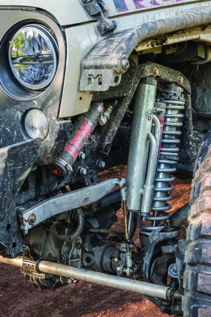 Close up of the Jeep's headlights and wheel well