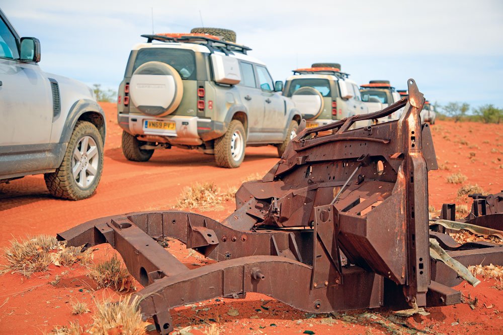 Rusted chassis left on the side of the road