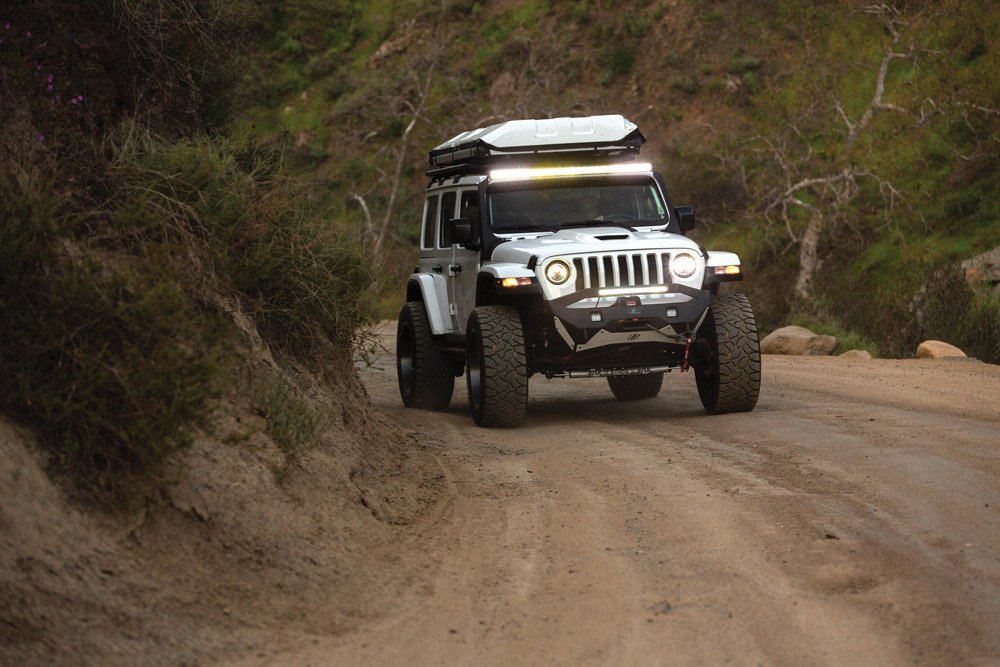 Driving shot of the Jeep on a dirt road