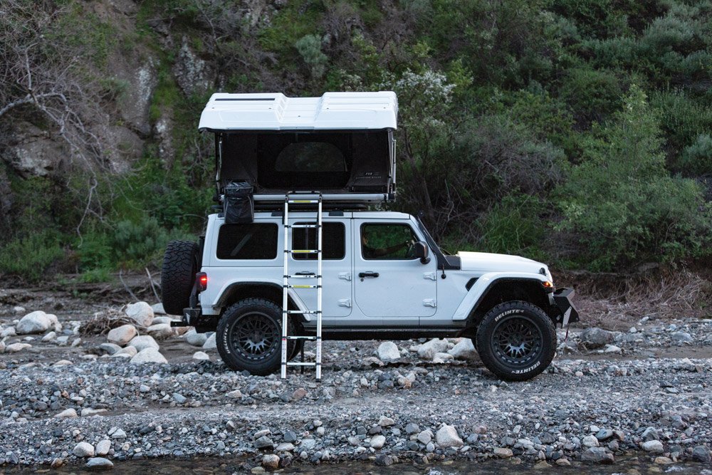 Carbon-fiber Extreme Dimensions Hellcat Hood and shell painted to match the Jeep Wrangler