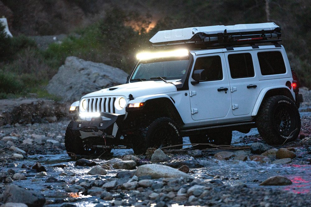 2018 Jeep Wrangler JLU near a creek