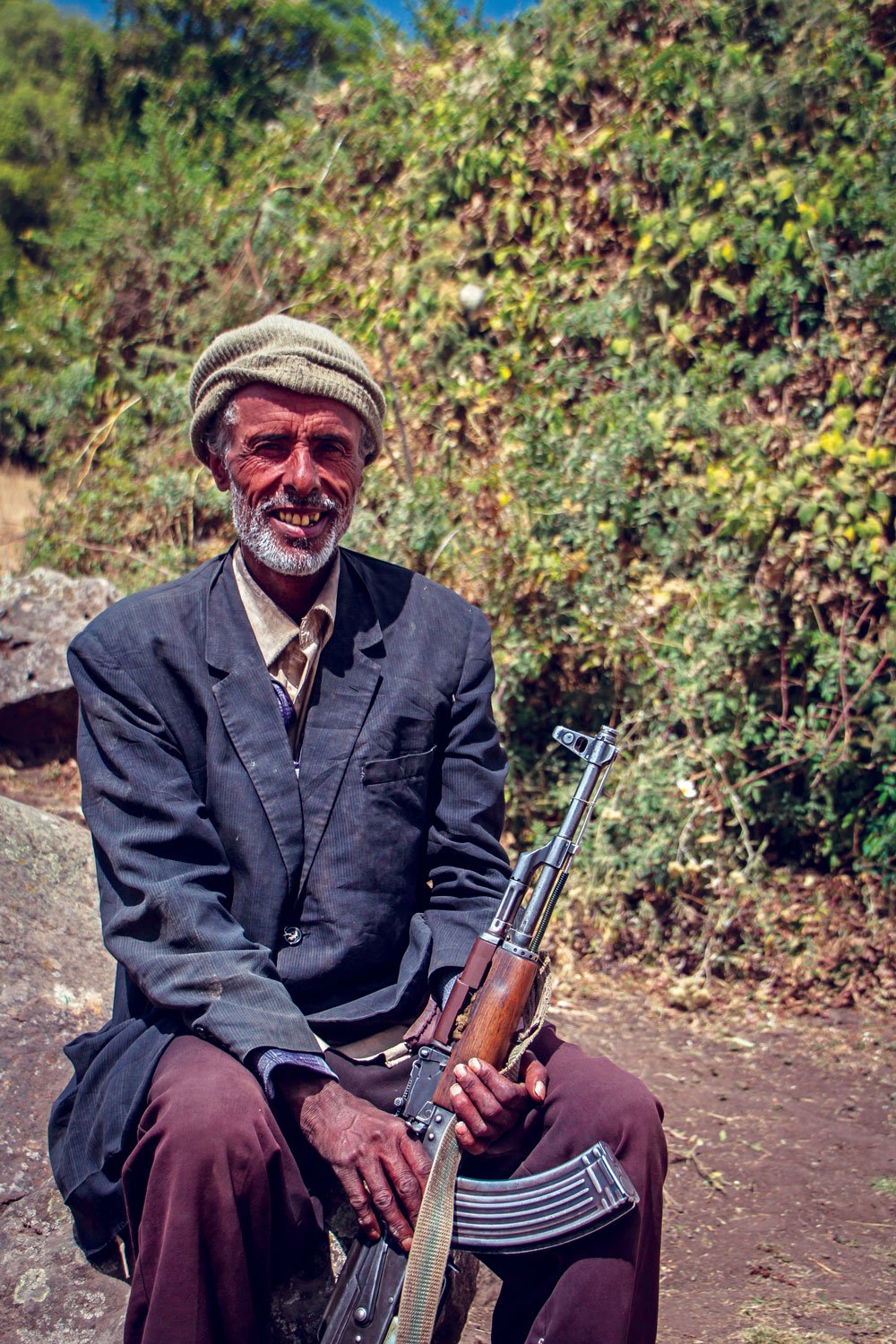 The Simien scout with his AK-47 bearing a smile