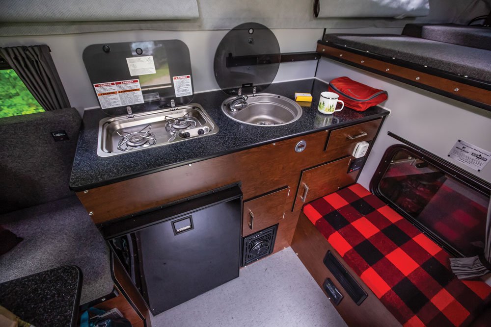 This Four Wheel Camper even includes the kitchen sink