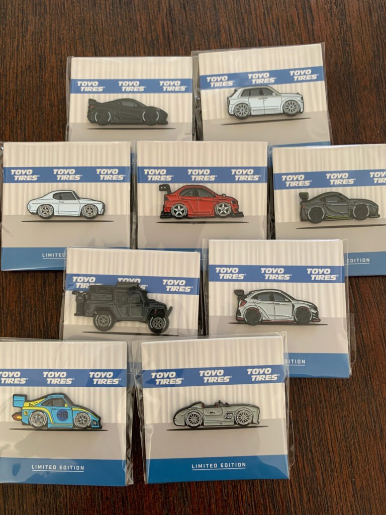 Different limited edition Leen Custom pins of custom vehicles