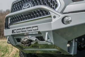 CBI front bumper, recovery points, light mounts, and a Warn winch mount