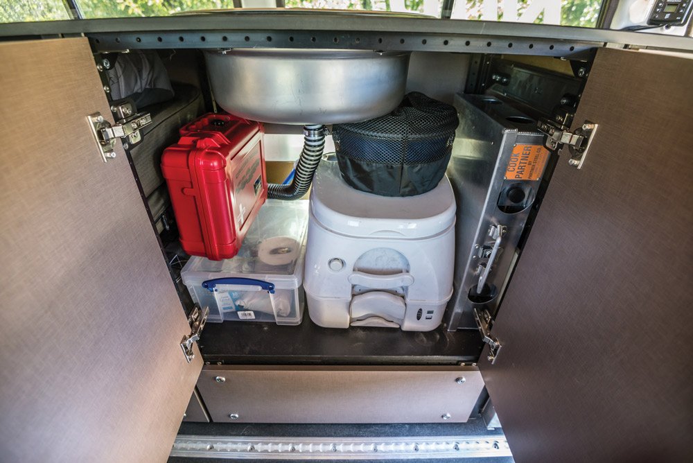 This overland rig includes a kitchen sink, stove and toilet