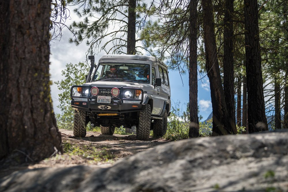 Toyota Land Cruiser pulled to the side of the road to enjoy the view