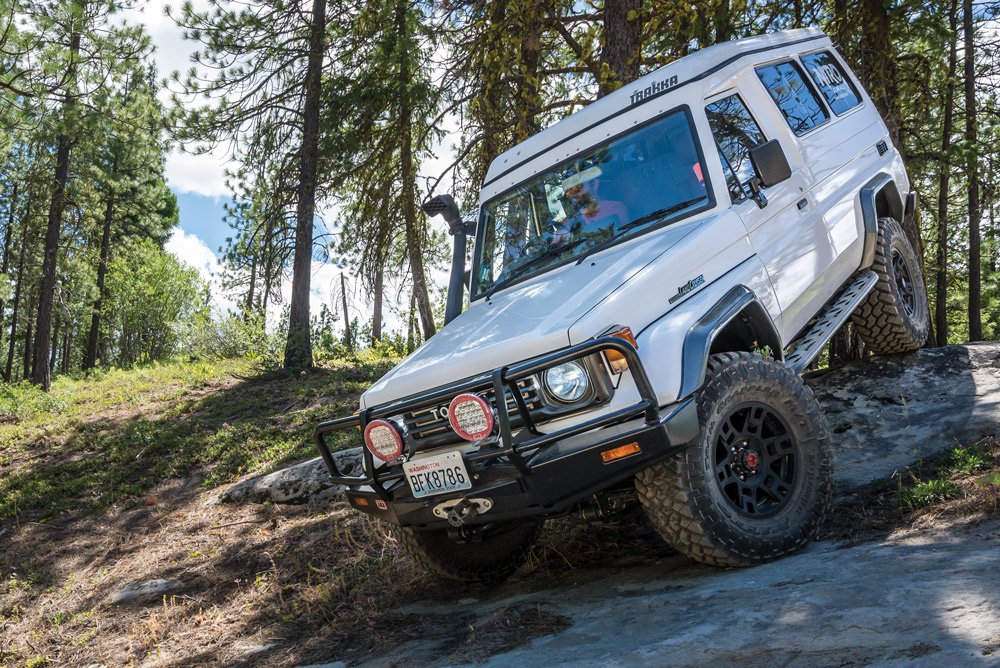 Toyota Land Cruiser rock climbing downhill