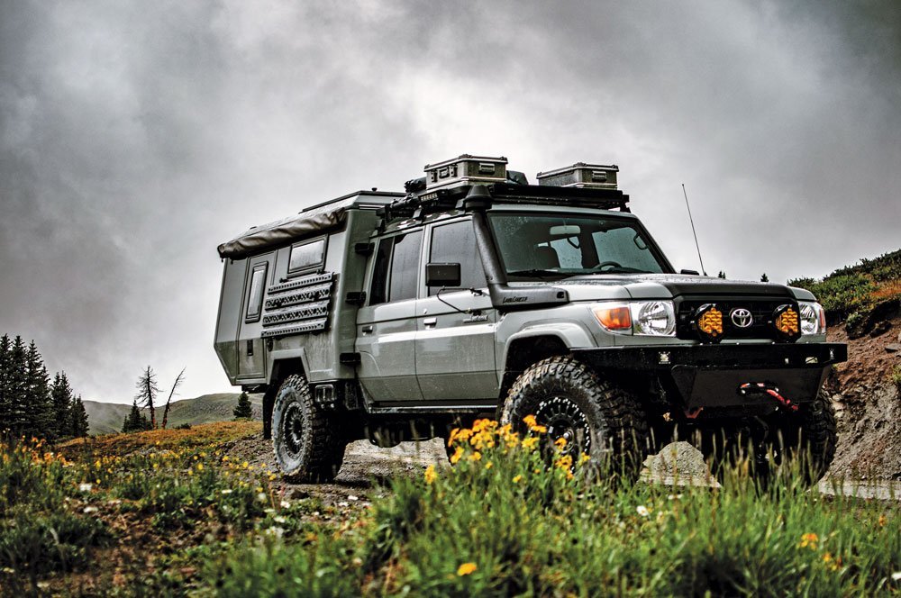 Maltec ’93 Land Cruiser 80/79 series parked on side of trail