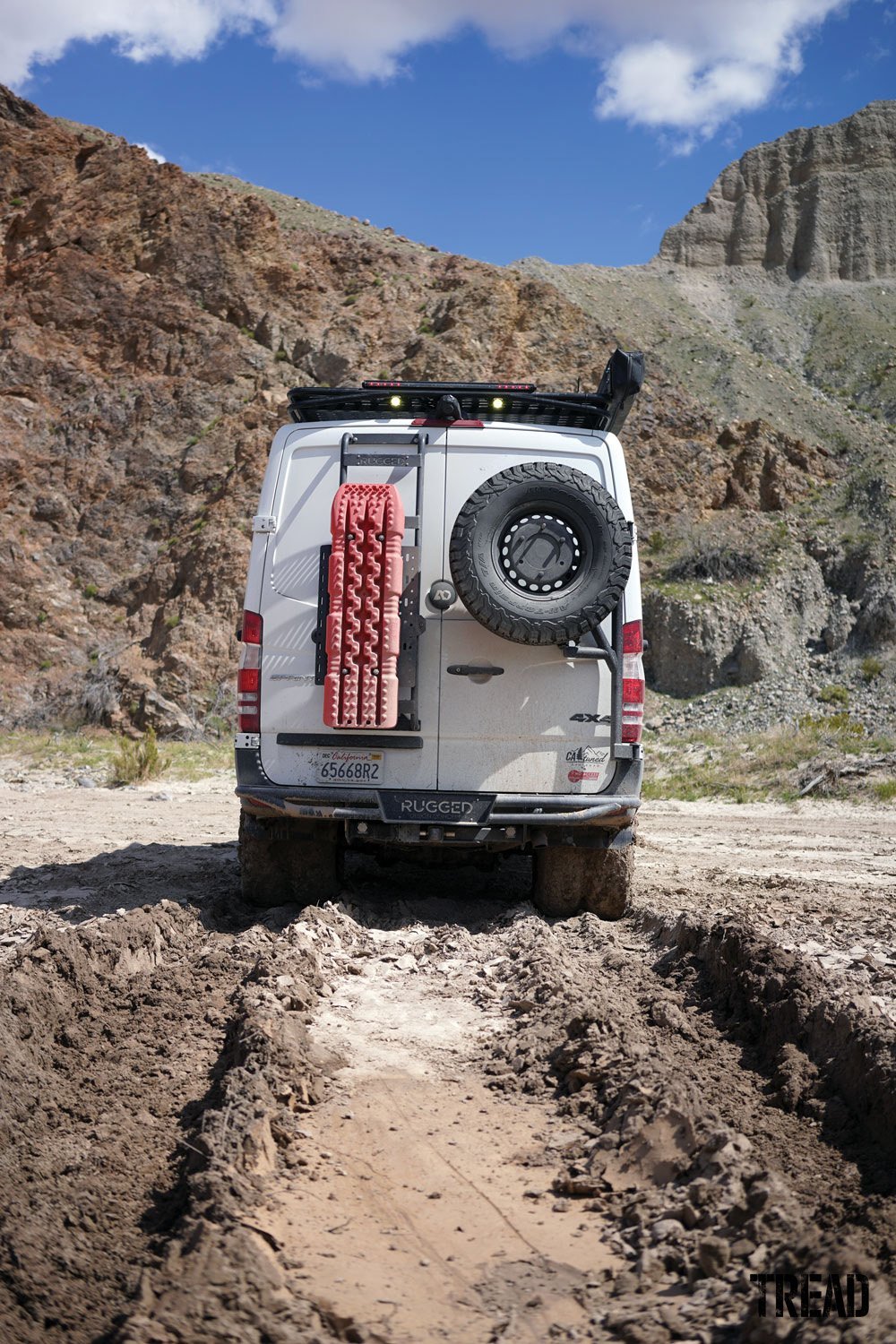 2018 Mercedes-Benz 4x4 3500 Sprinter van outfitted with traction boards and spare tire