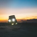 Jeep during sunset in desert
