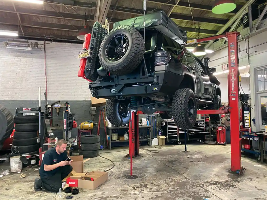 Toyota 4Runner on the lift getting upgraded suspension