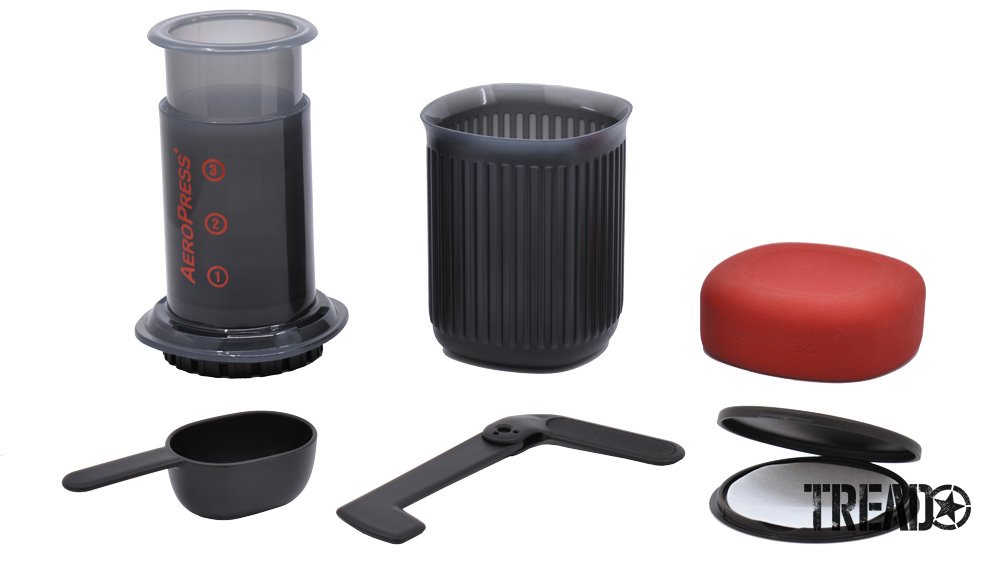 The AeroPress Go contents neatly fit into the dark gray supplied cup and red silicone cover.