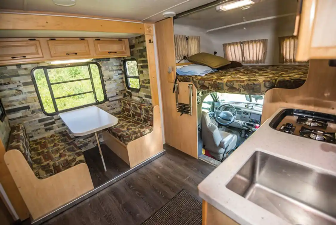 Nitro Gear RV kitchen, dinette, and overhead bed