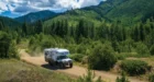Nitro Gear Ultimate Adventure RV driving along a remote road