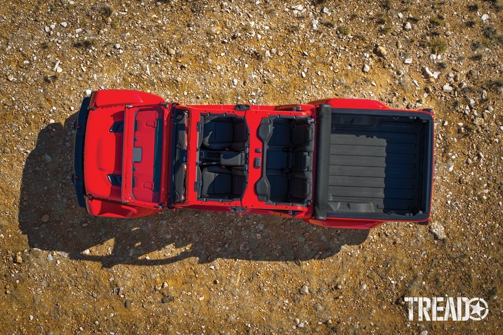 This red Jeep Gladiator EcoDiesel has removable doors and roof, the windscreen folds down
