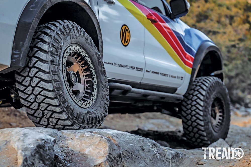 The 2019 Ford Ranger showcases knobby Maxxis RAZR M/Ts with bronze-colored Fuel Offroad Warp Beadlock wheels.