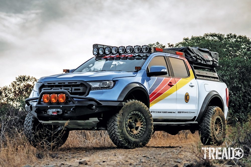 2019 Ford Ranger is loaded up with gear, it's multi-colored striped sides and tons of aux lights accent this off-road truck.