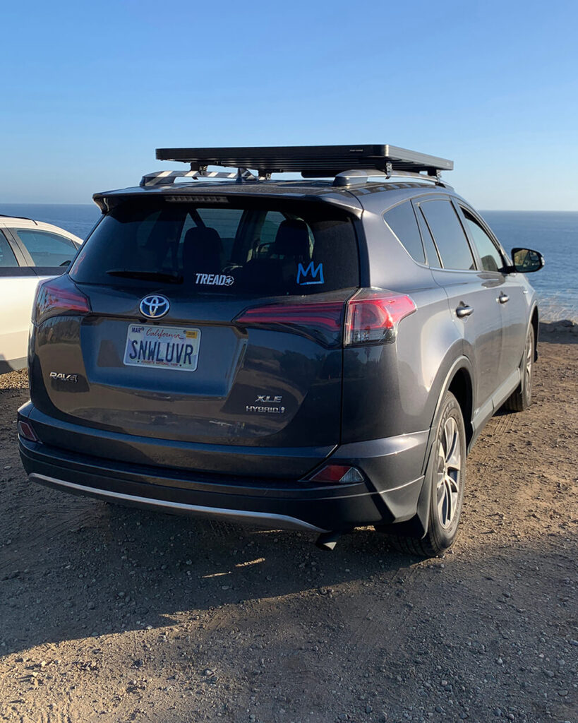 Rear view of RAV4 with Front Runner Outfitters roof rack mounted to factory side rails.