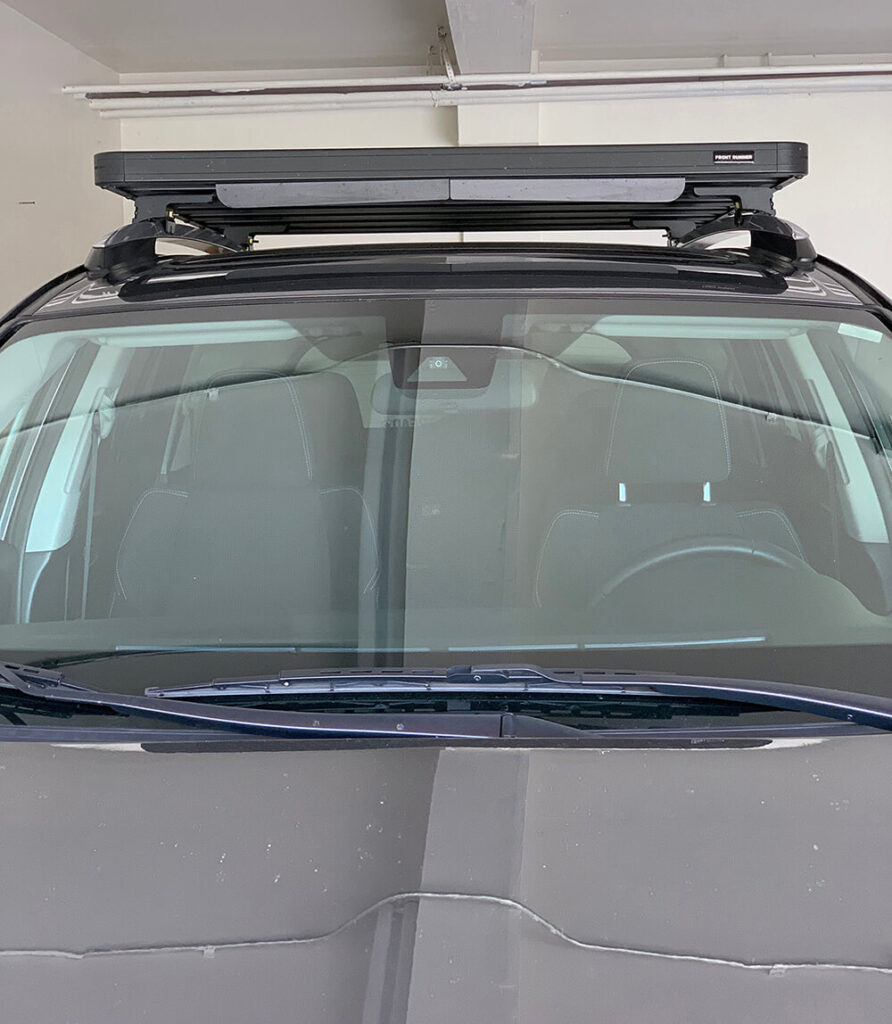 Front view of RAV4 with Front Runner Outfitters roof rack mounted to factory side rails.