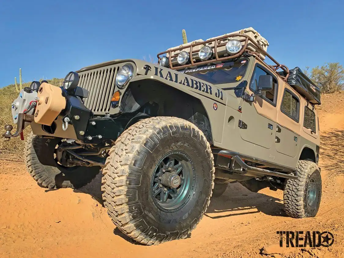 The J1 Jeeps rolls on 17-inch Raceline/Allied wheels shod with 40×13.5R17 Goodyear Wrangler MT/R tires