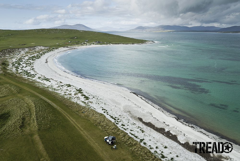 The Scottish Highlands offer beautiful light-colored sand beaches next to green plains and hills. 