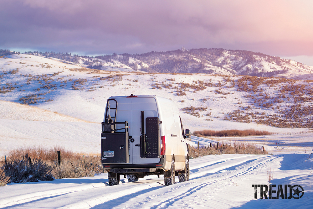 This white third gen Sprinter van is equipped with a 39-gallon LRA replacement tank and drives in Idaho hillsides. 