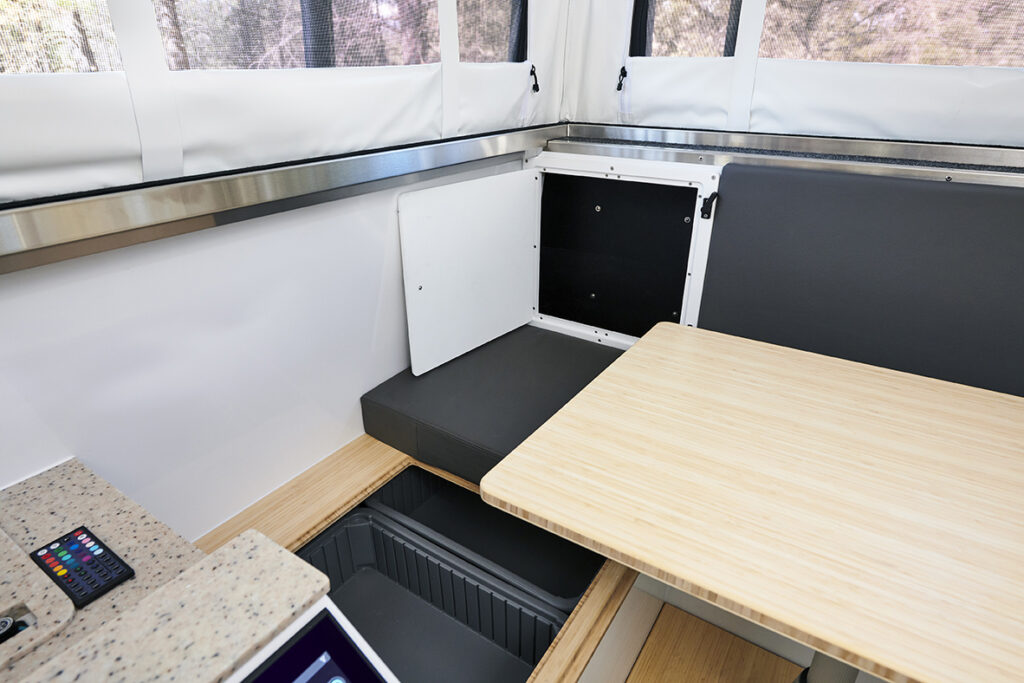 Dinette area has additional storage compartments