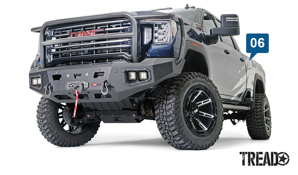 WARN/Ascent HD Front Bumper For 2020 GMC 2500/3500 has a full brush guard and is powdercoated black. It also has allowances for aux lights and a WARN winch.