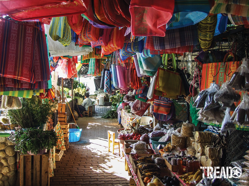 Bright colors goods and smiling faces complete the picture of a Baja marketplace.