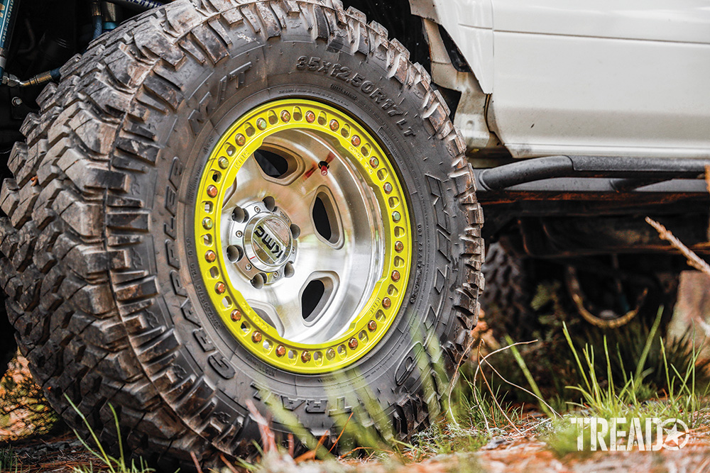 The off-road Lexus GX470 currently showcases silver wheels with a yellow ring around it's exterior, shod with beefy Nitto off-road tires.