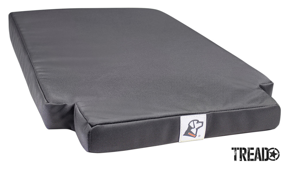 This nearly rectangular dark gray dog bed has a 1680 Denier-rated, ballistic nylon cover. It incorporates 2-inch cooling memory foam.