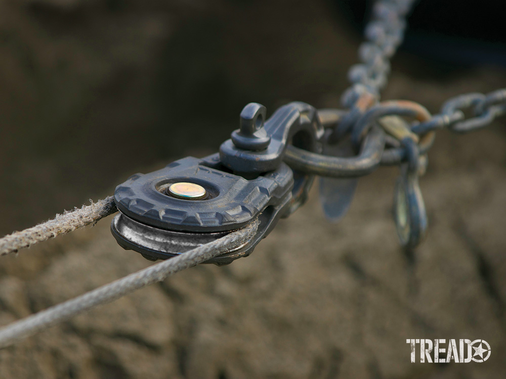 A WARN Epic snatch block and shackle is being used during a beach recovery.