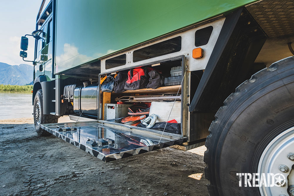 Extra storage on the underside of the MAN expedition truck helps keep this family on the road for months at a time.