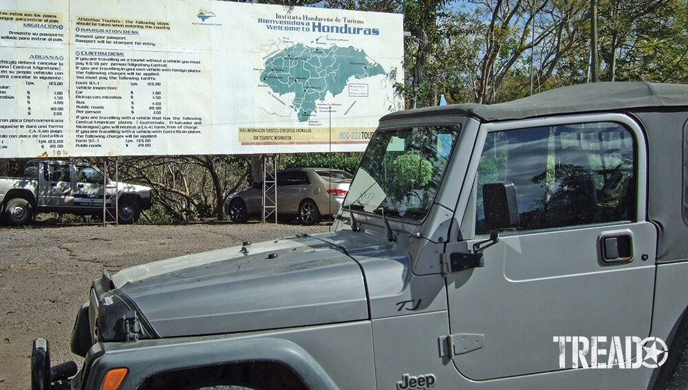 At the border, the author waits to enter Honduras.